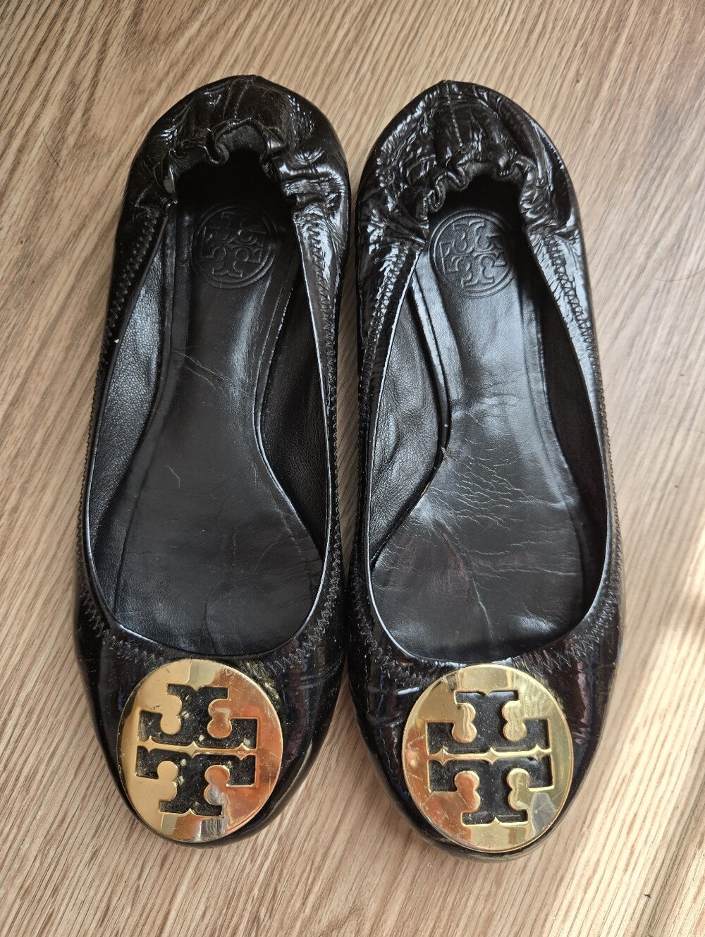 Tory Burch Black Patent Reva Flats with Gold Logo Medallions
